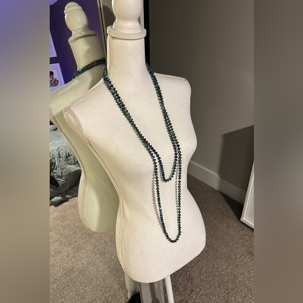 Turquoise precious stone necklace.